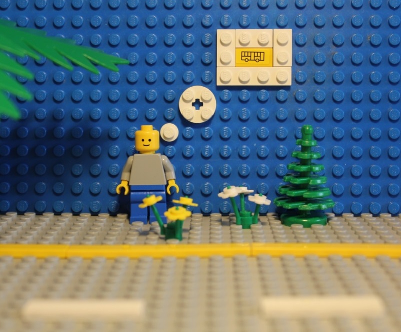 Mr. B is stranded and imagines a bus coming to get him. His imagination is built in bricks