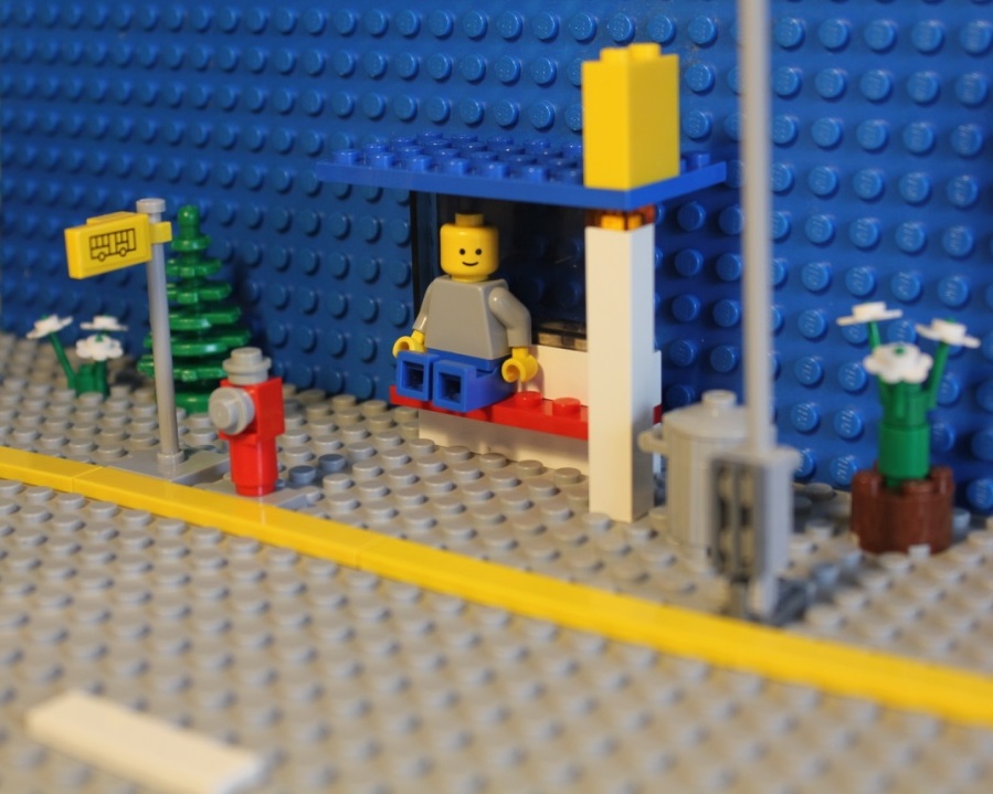 The bus-stop is complete, and Mr. B is waiting for a bus to come and get him
